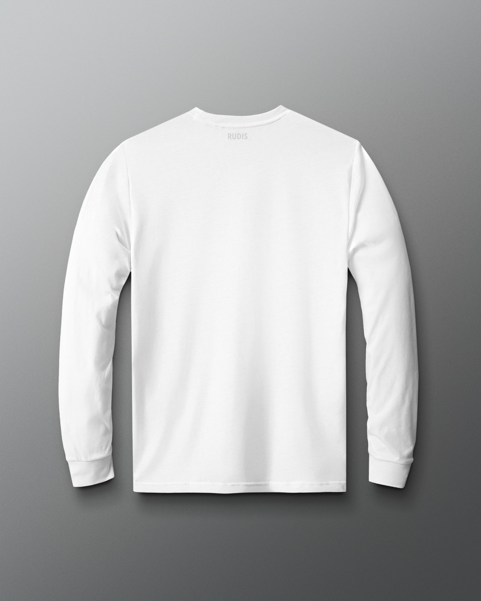 A white long-sleeve crewneck shirt shown from the back, featuring a small black 'RUDIS' brand logo printed at the inner neckline, set against a dark gray gradient background.