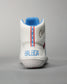 A rear view of a modern white sneaker designed for athletic use featuring blue and red accents along the heel and a textured sole for grip