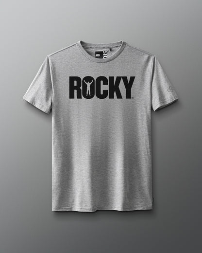 Front view of a gray T-shirt featuring the classic black 'ROCKY' logo across the chest, with the silhouette of a victorious boxer inside the letter 'O,' inspired by the original Rocky movie.