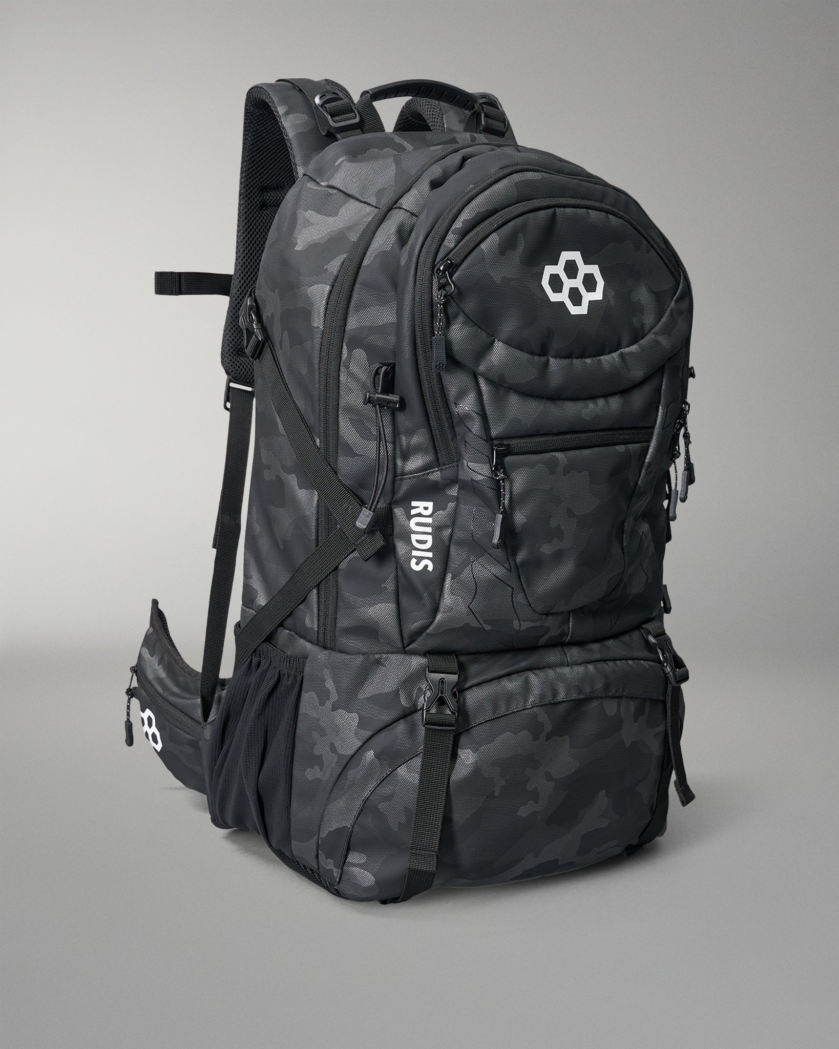 Black camouflage backpack with visible branding on a gray background