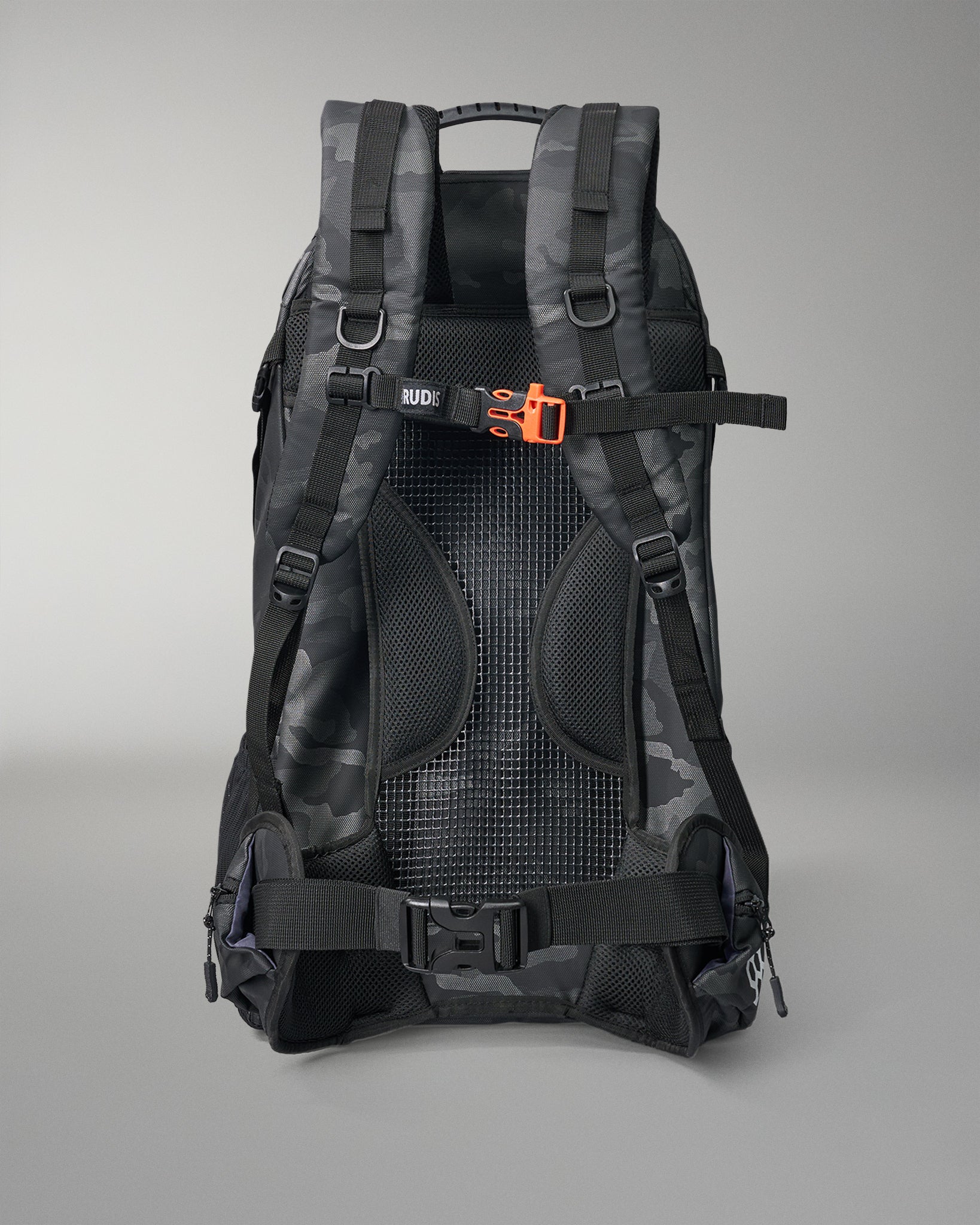 Black backpack with orange accents on a gray background