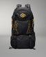 A black technical backpack with bright orange accents, including a geometric logo on the front pocket and vertical branding details, shown against a neutral gray background.