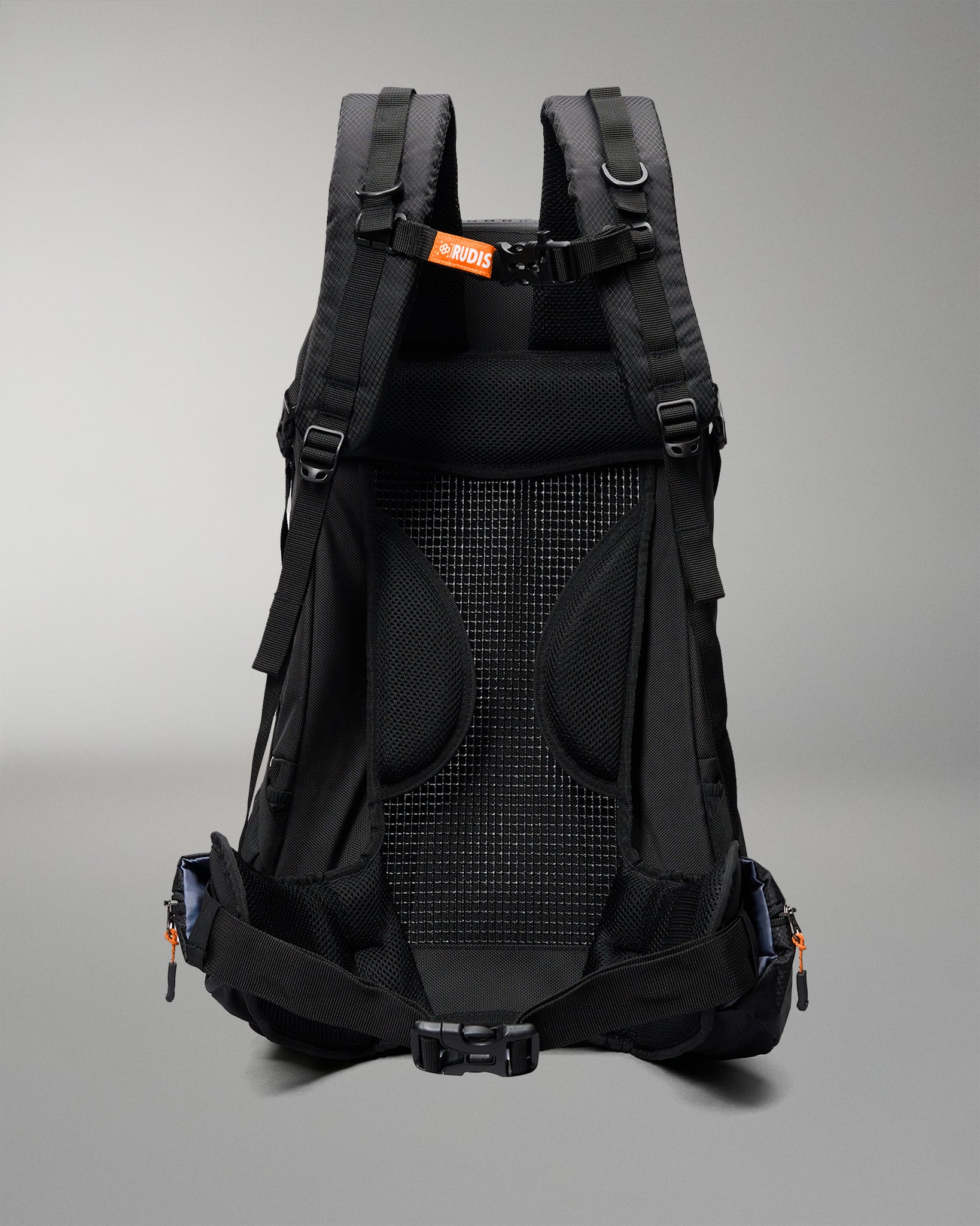 The back view of a black PRO2000 hiking backpack, showing the breathable mesh back panel, padded shoulder straps, and side compression buckles against a neutral gray background.
