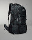 Green Camo backpack with visible branding on a gray background