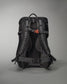 A sleek black backpack designed for outdoor adventures featuring padded straps a mesh back panel and an adjustable buckle for comfort and stability