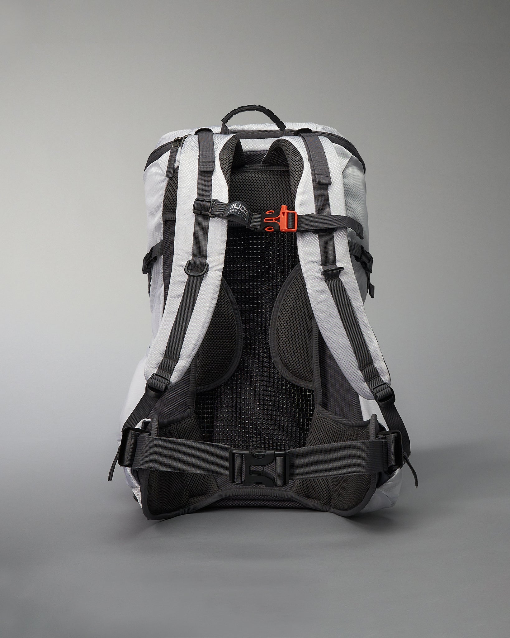 A modern backpack with a sleek design in gray and black featuring padded straps and a mesh back for comfort