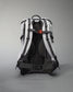 A modern backpack with a sleek design in gray and black featuring padded straps and a mesh back for comfort