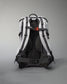A modern backpack with a sleek design in gray and black featuring padded straps and a mesh back for comfort