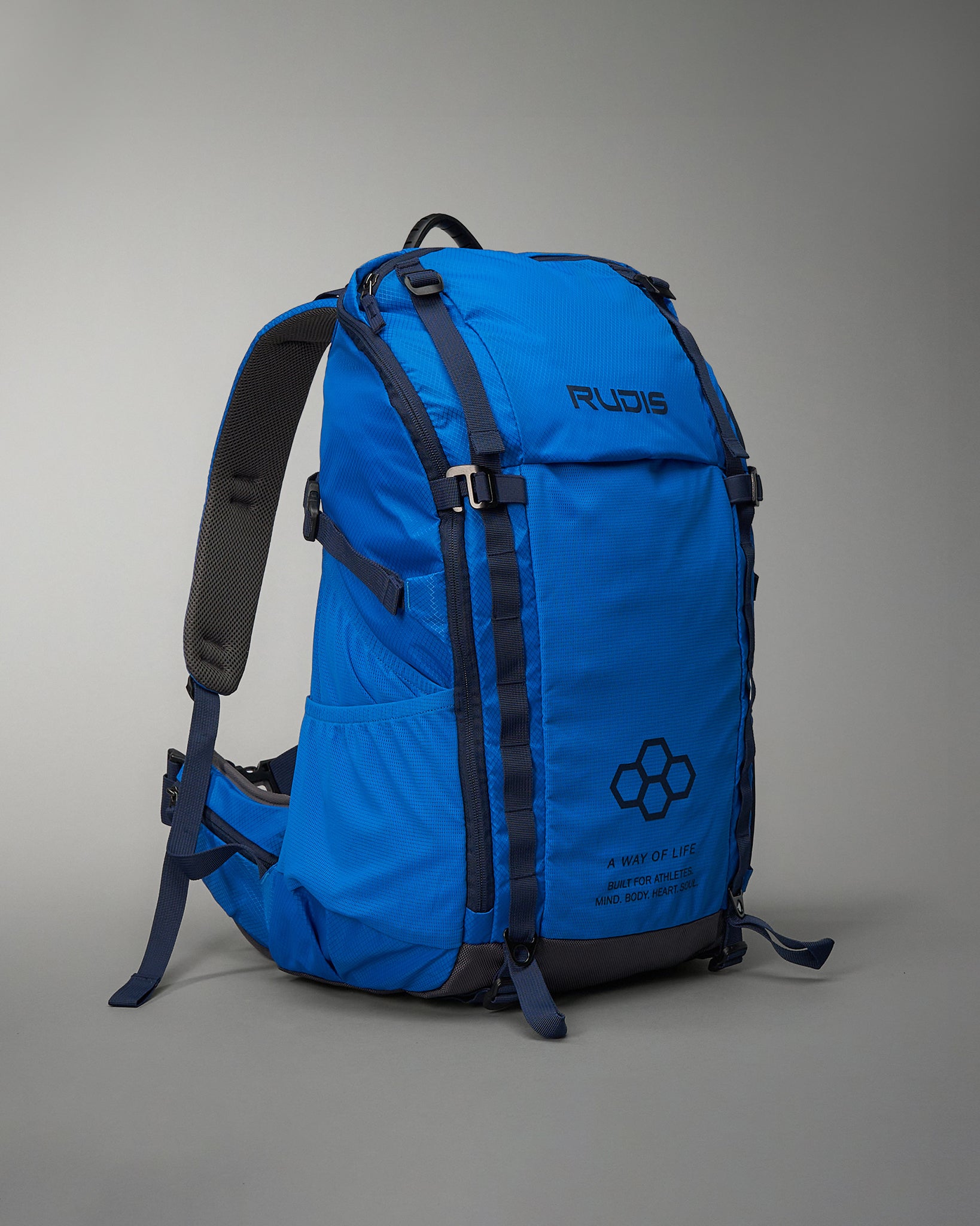A vibrant blue athletic backpack designed for durability and functionality featuring adjustable straps and a motivational slogan