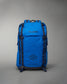 A vibrant blue athletic backpack features a sleek design with the brand name RUDIS prominently displayed accompanied by motivational text about fitness and well-being