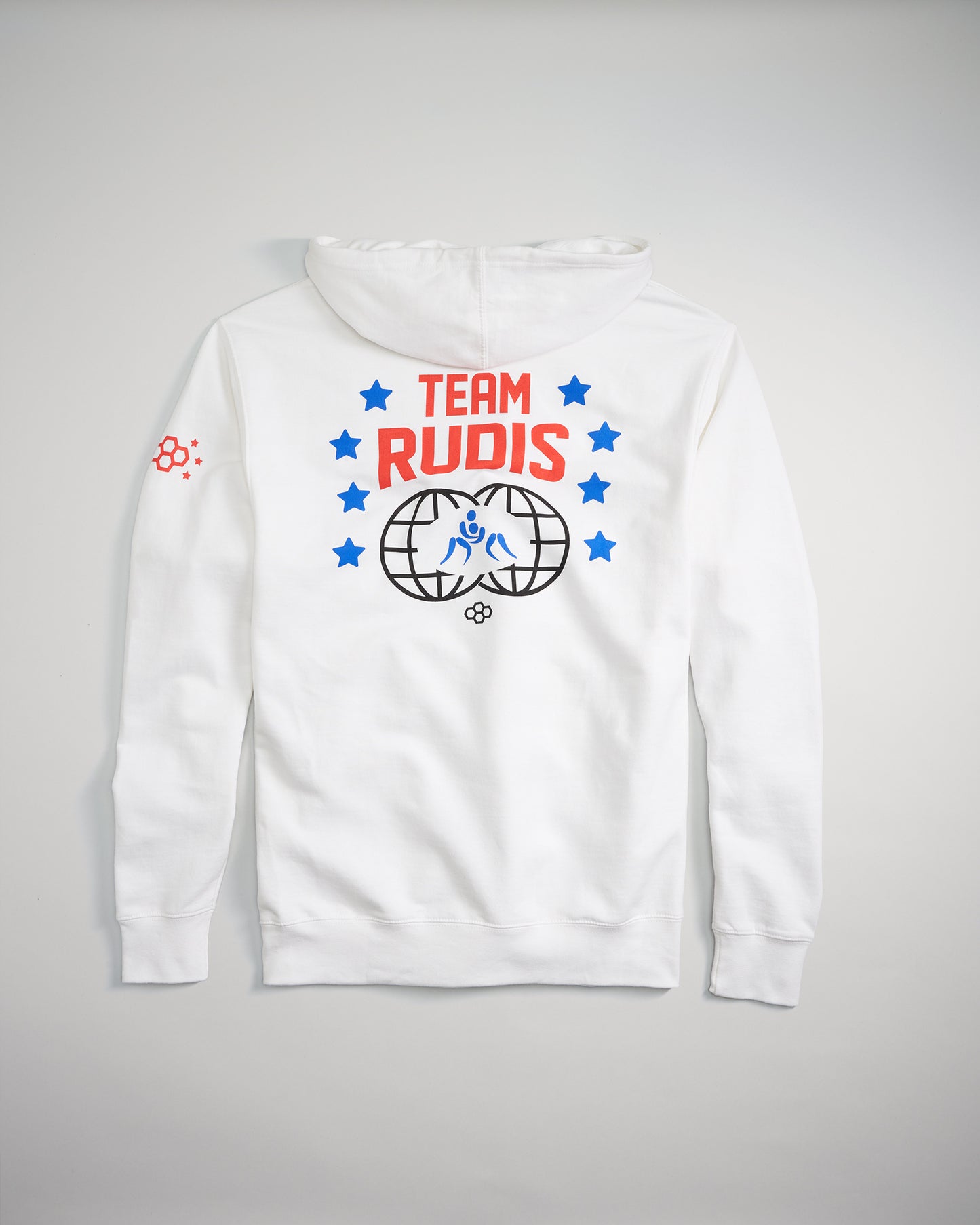 A white hoodie featuring the phrase TEAM RUDIS in bold red letters accompanied by blue stars and a graphic design of a globe with a wrestling figure