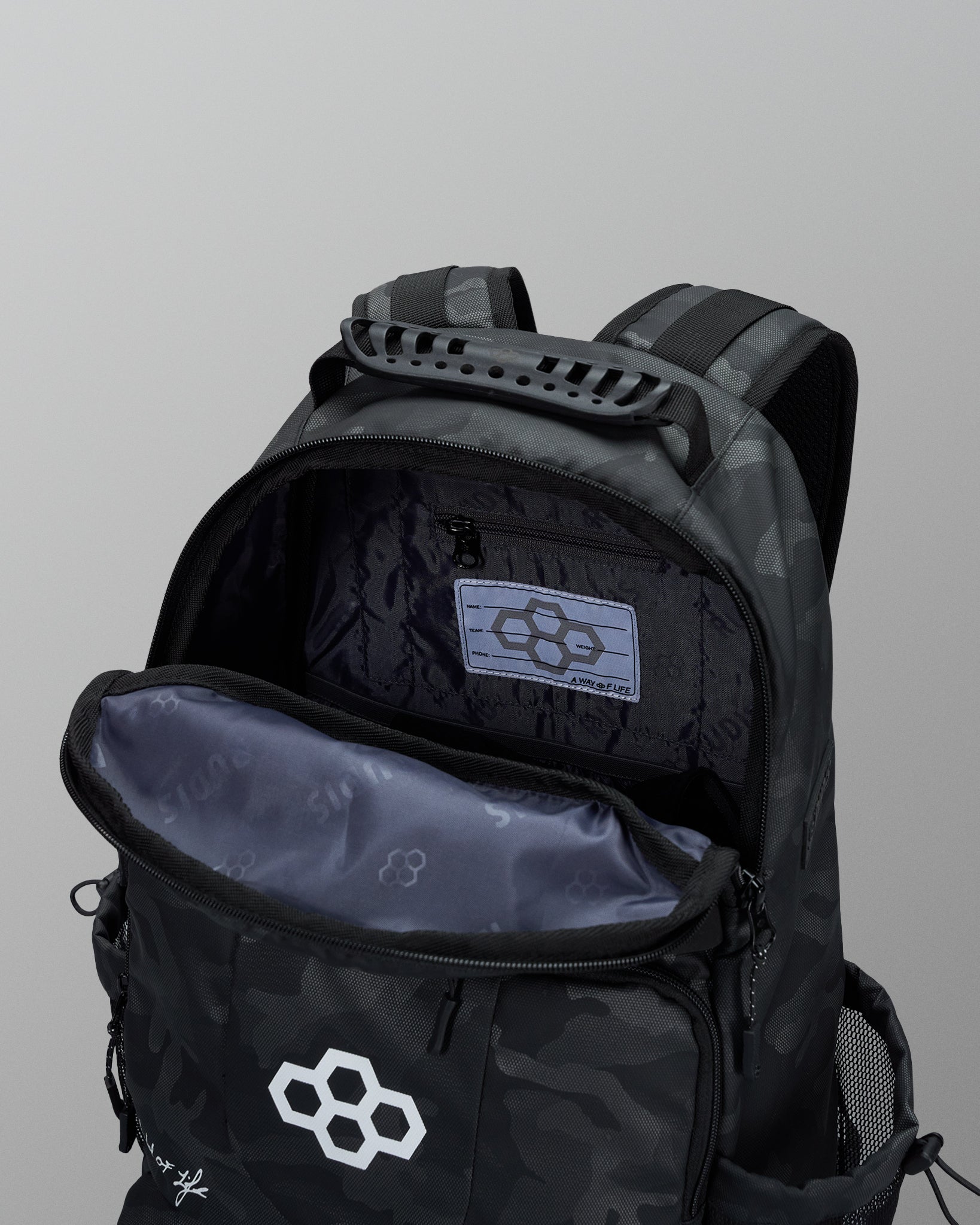 Black backpack with a brand logo on a gray background