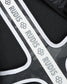 Close-up of a black and gray product with 'RUDIS' branding.