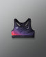 Sports bra with gradient design and brand logo on a gray background
