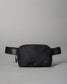 Black waist bag on a gray background