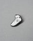White sneaker with black accents on a gray background