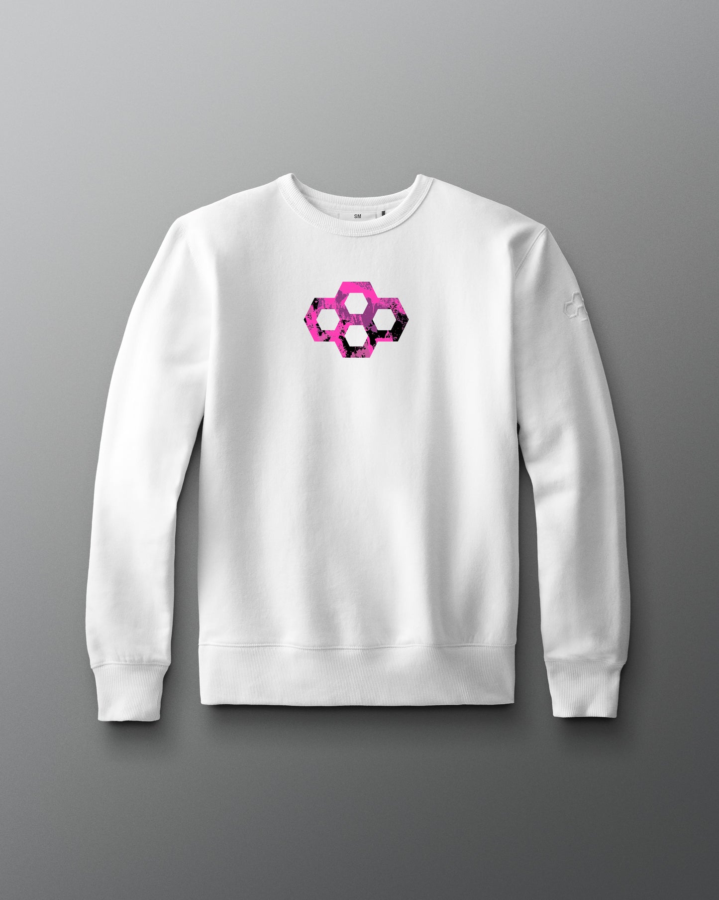 White sweatshirt with a geometric pink and black design on a gray background