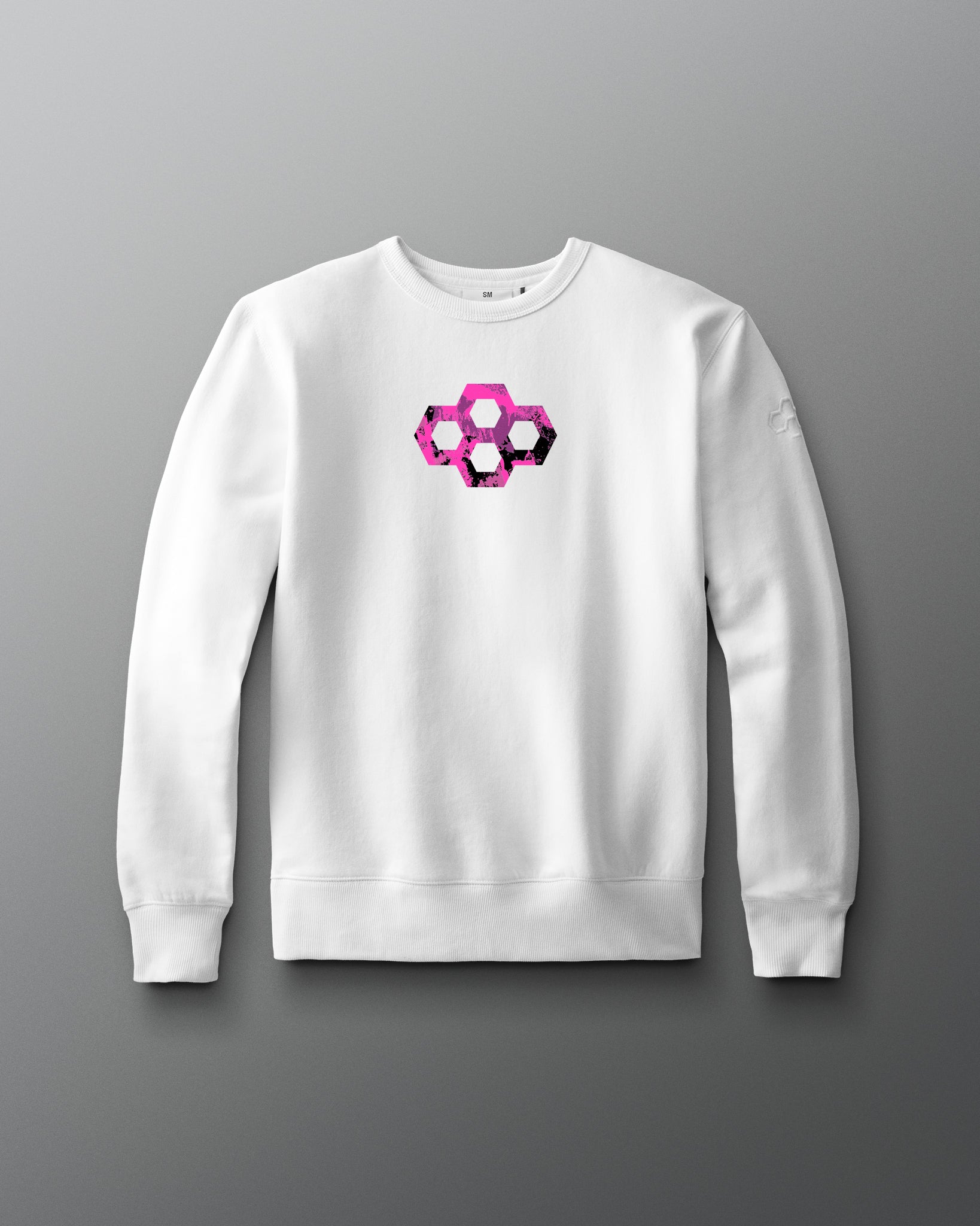 White sweatshirt with a geometric pink and black design on a gray background