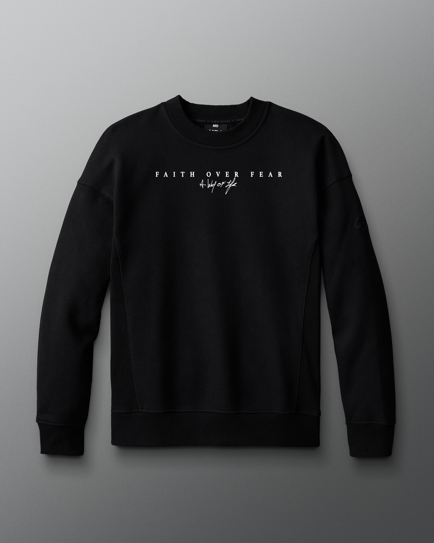 Black sweatshirt with text on a gray background. 