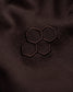 Close-up of a brown fabric with an embroidered hexagonal pattern.