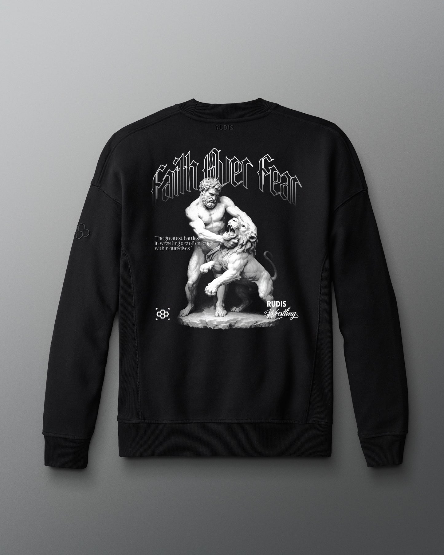 Black sweatshirt with graphic design and text on a gray background