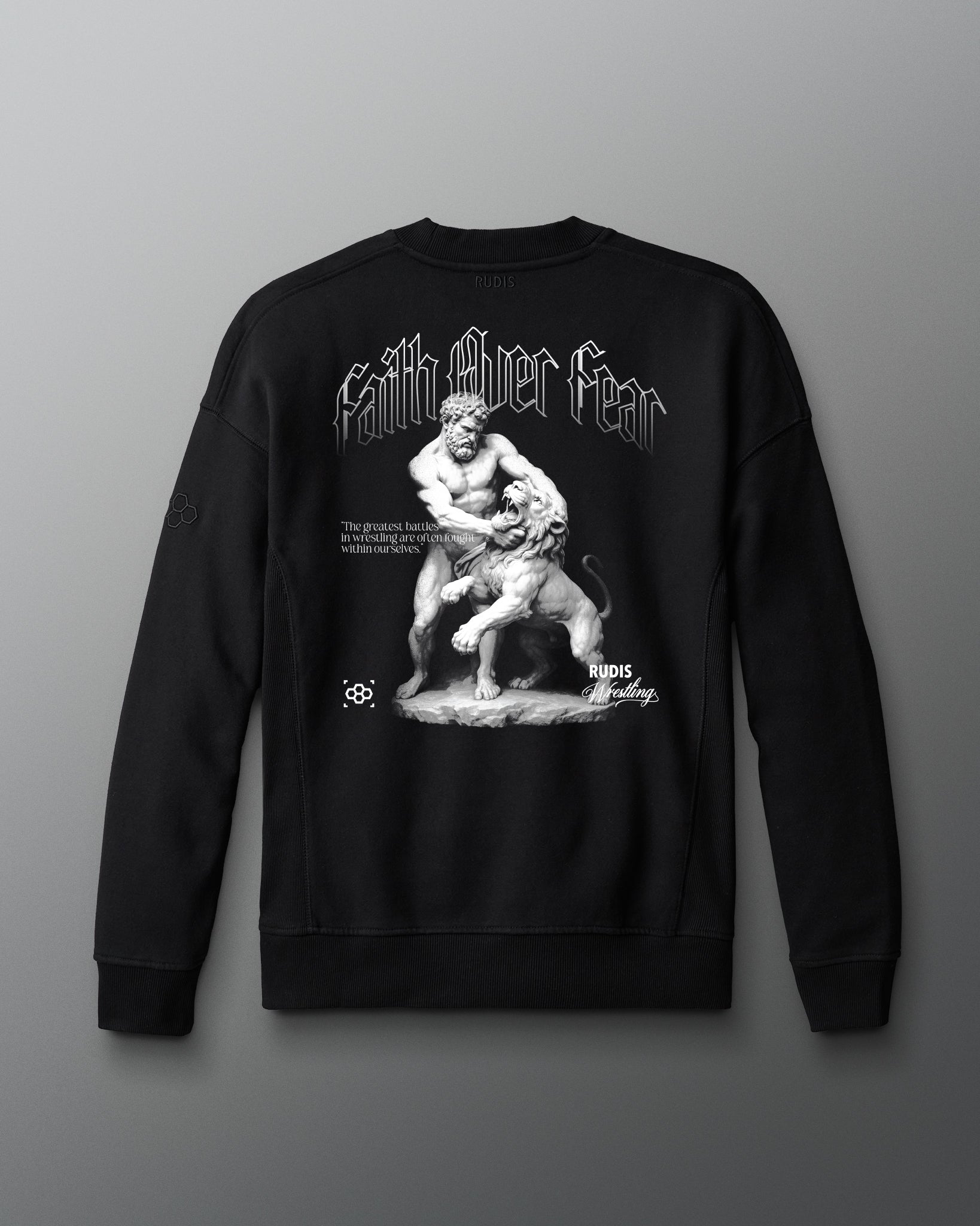 Black sweatshirt with graphic design and text on a gray background