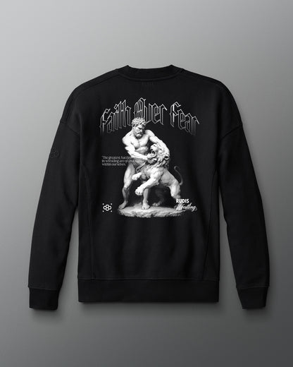 Black sweatshirt with graphic design and text on a gray background