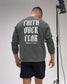 Person wearing a gray sweatshirt with 'Faith Over Fear Wrestling' text on the back, standing against a plain background.