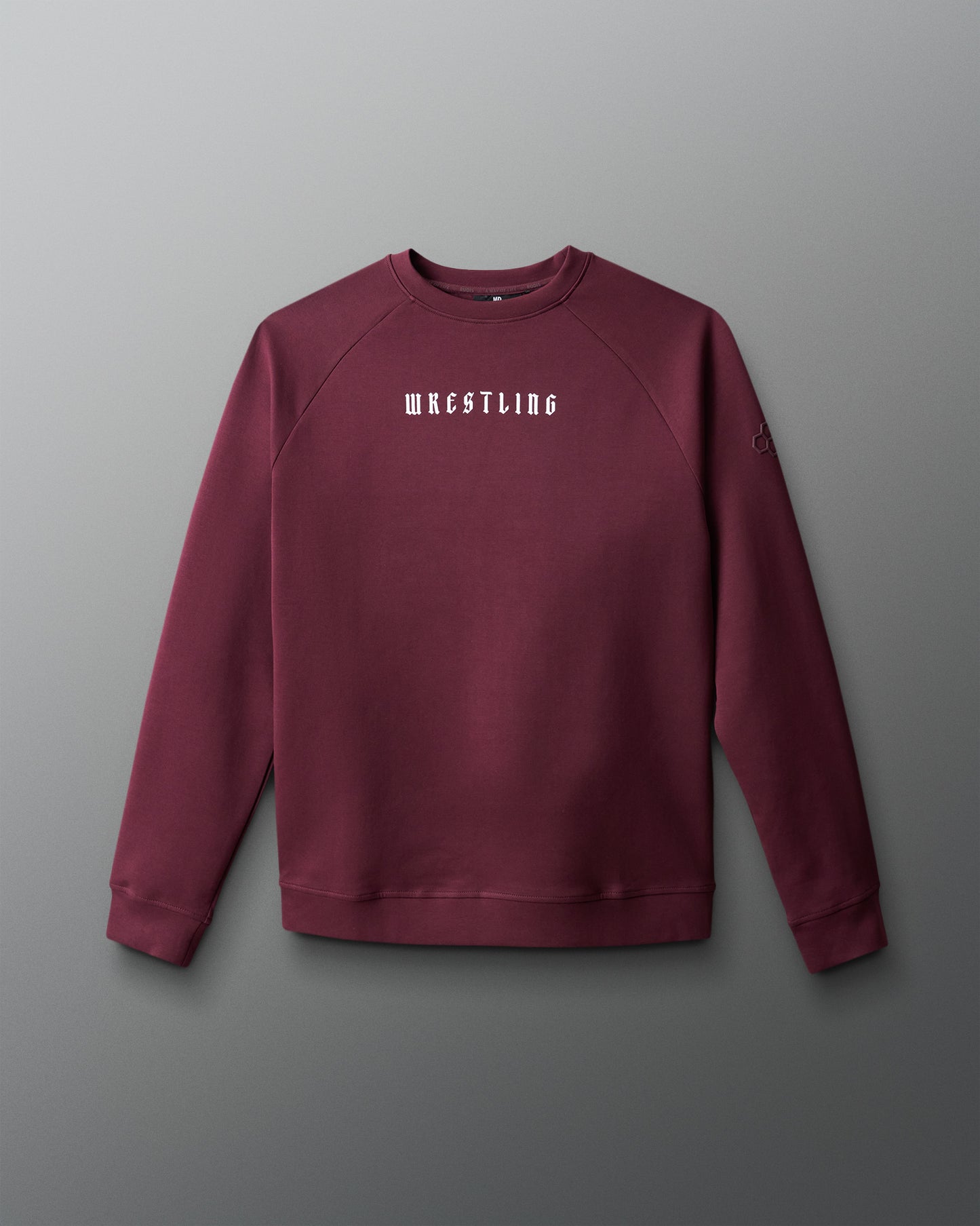 Maroon sweatshirt with 'WRESTLING' text on a gray background