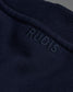 Navy blue fabric with 'RUDIS' branding