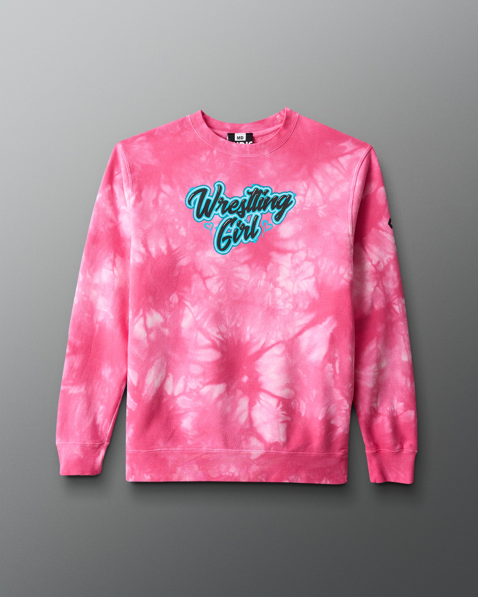 Pink tie-dye sweatshirt with 'Wrestling Girl' text on a gray background