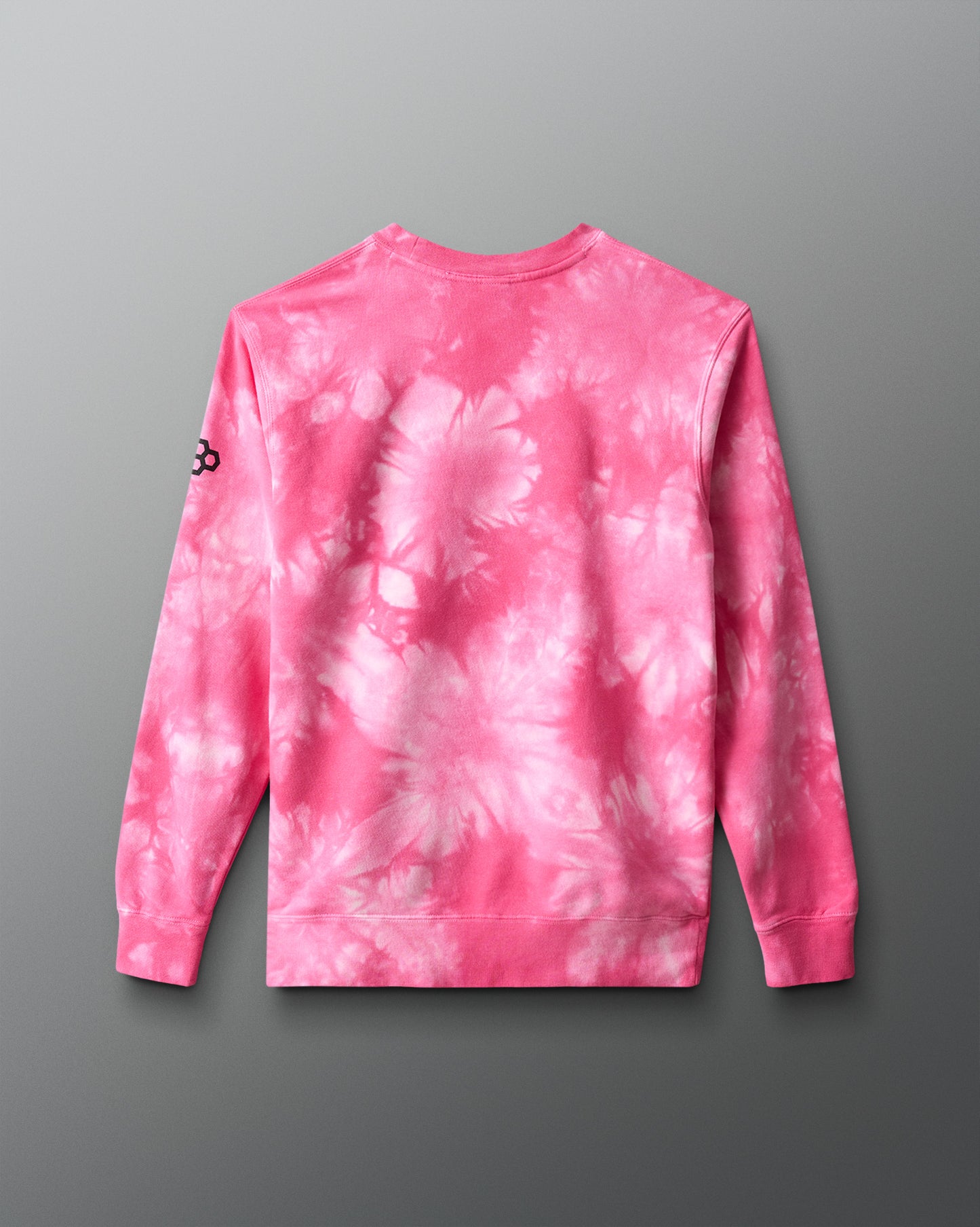 Pink tie-dye long-sleeve shirt on a gray background