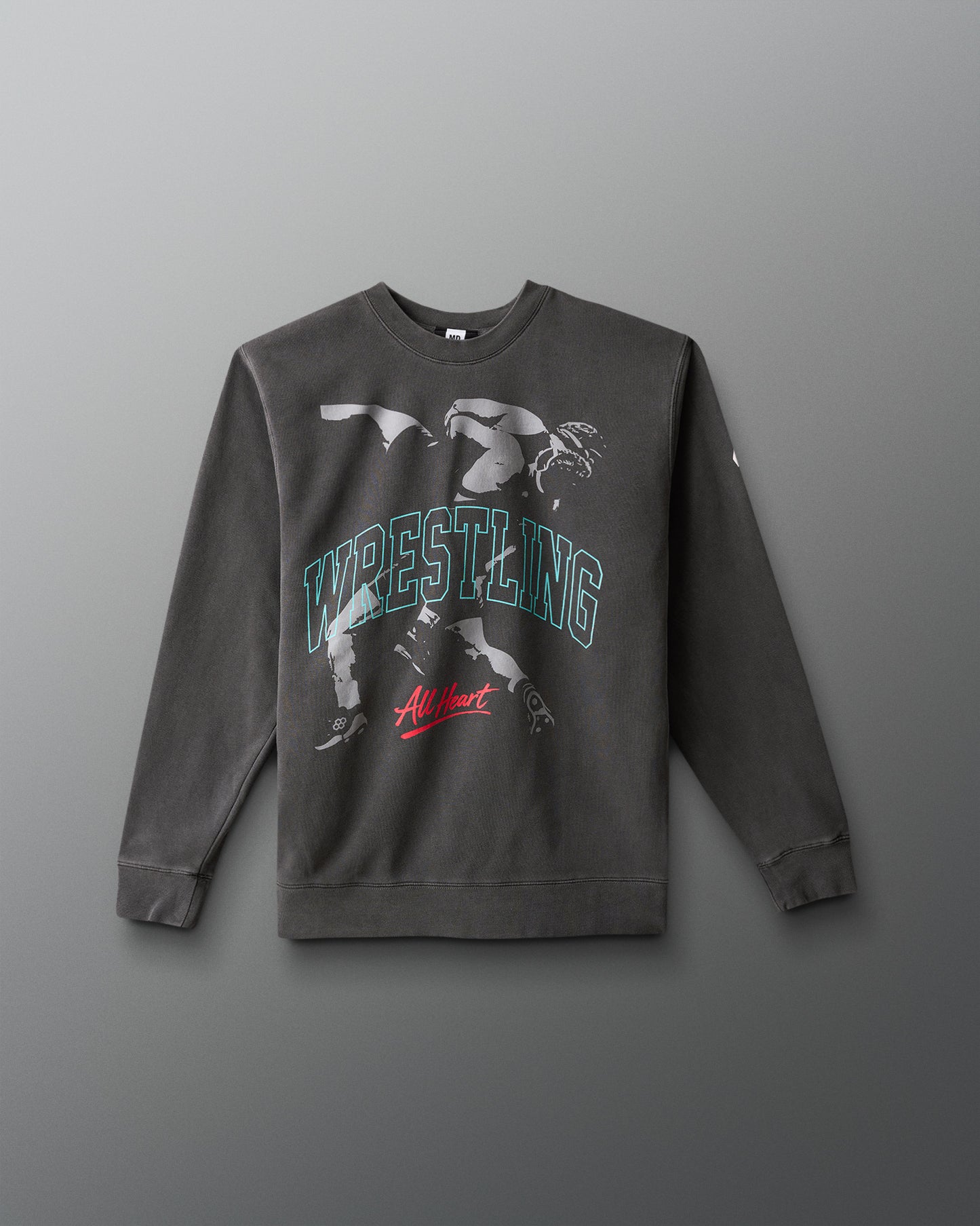 Gray sweatshirt with wrestling graphic and text on a gray background