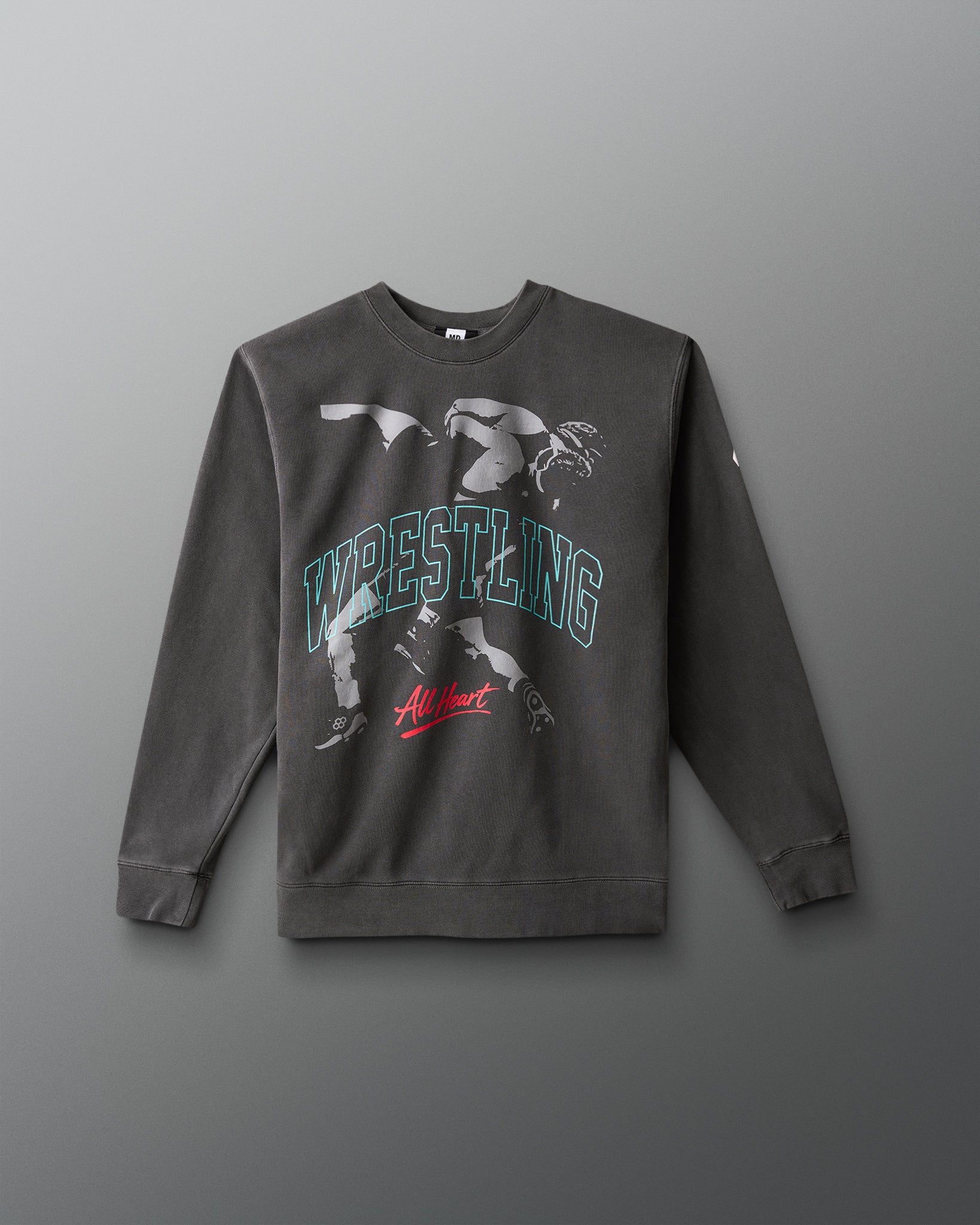 Gray sweatshirt with wrestling graphic and text on a gray background