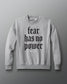 Gray sweatshirt with 'fear has no power' text on a gray background