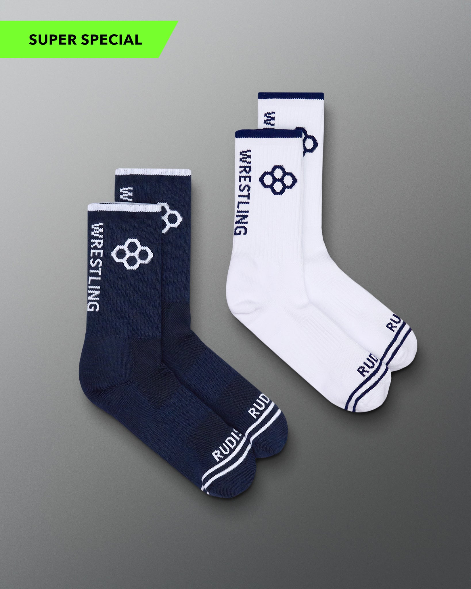 Pair of navy and white wrestling socks on a gray background