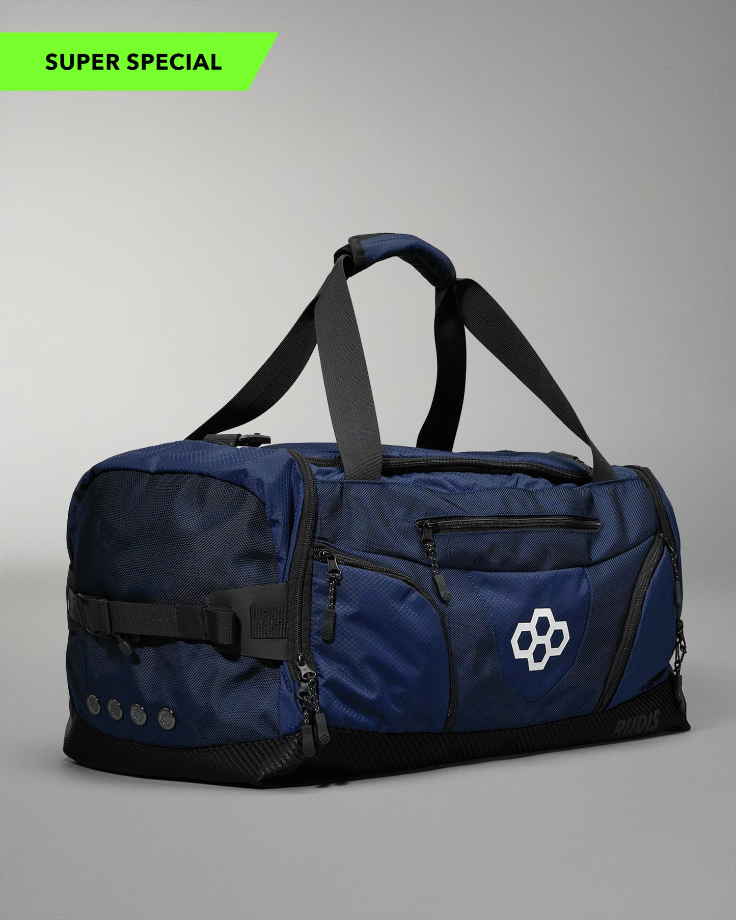 Blue duffel bag with black straps on a gray background