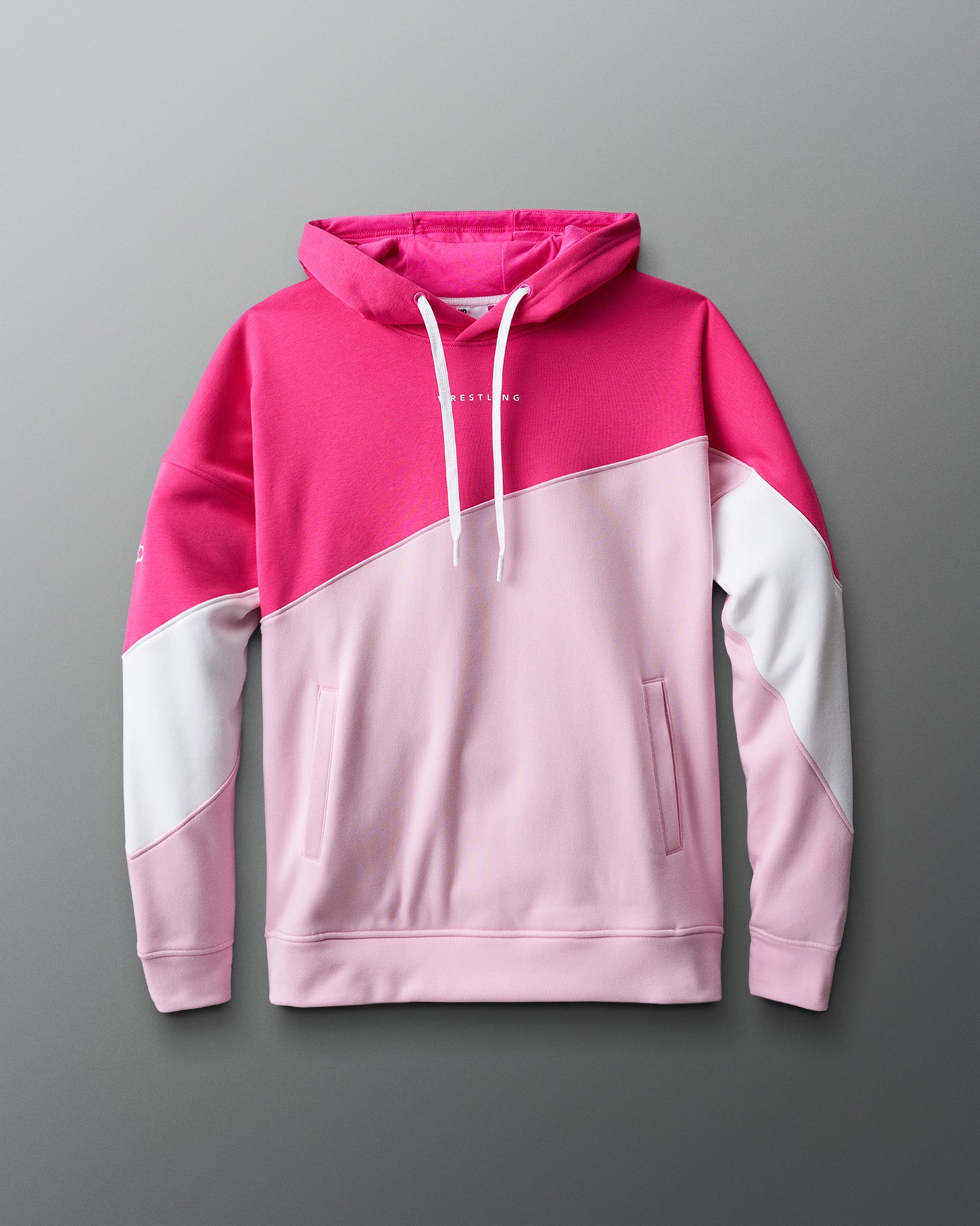 Pink and white hoodie on a gray background
