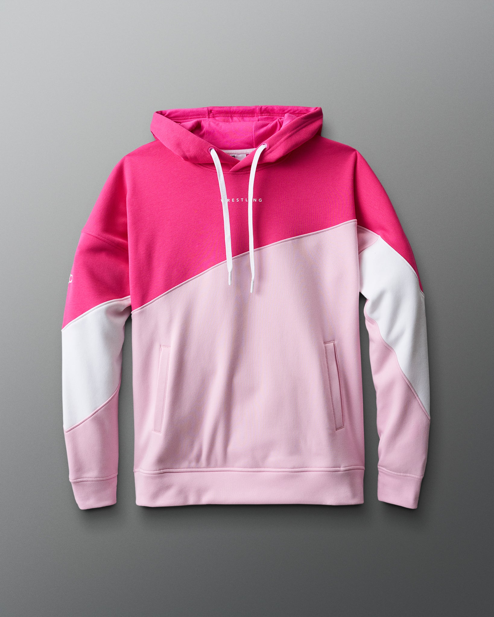 Pink and white hoodie on a gray background