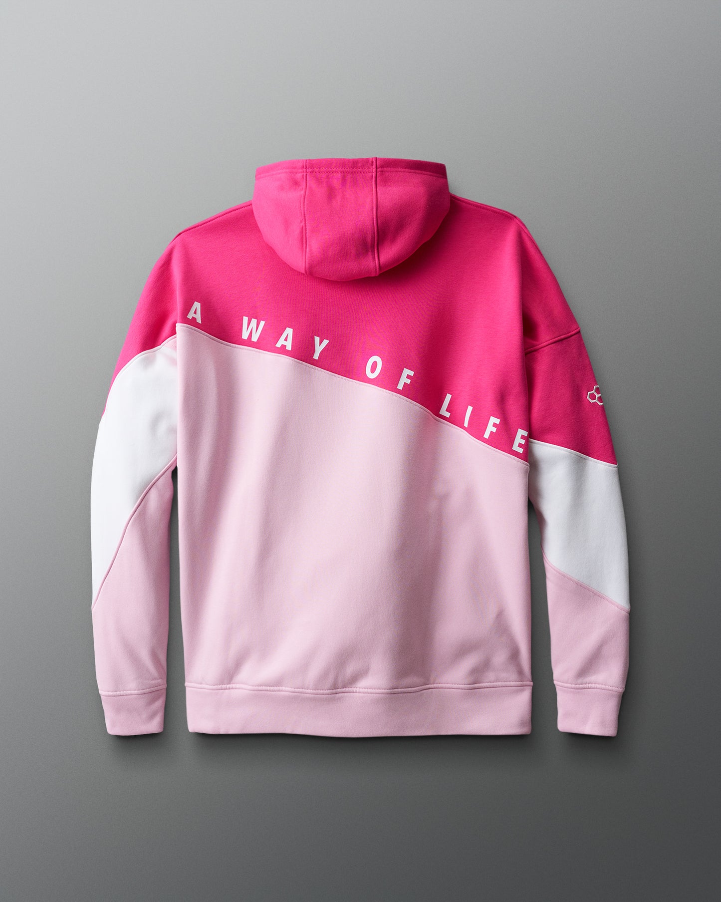 back view of Pink and white hoodie with "A WAY OF LIFE" text on a gray background