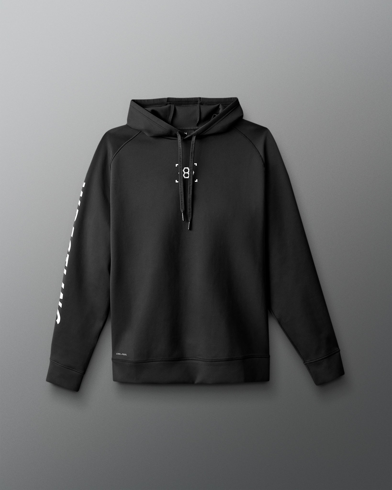 Black hoodie with white text on sleeves against a gray background