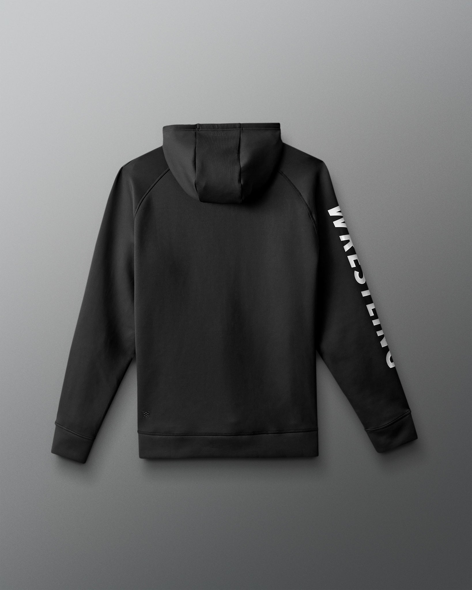 Black hoodie with white text on sleeve against a gray background