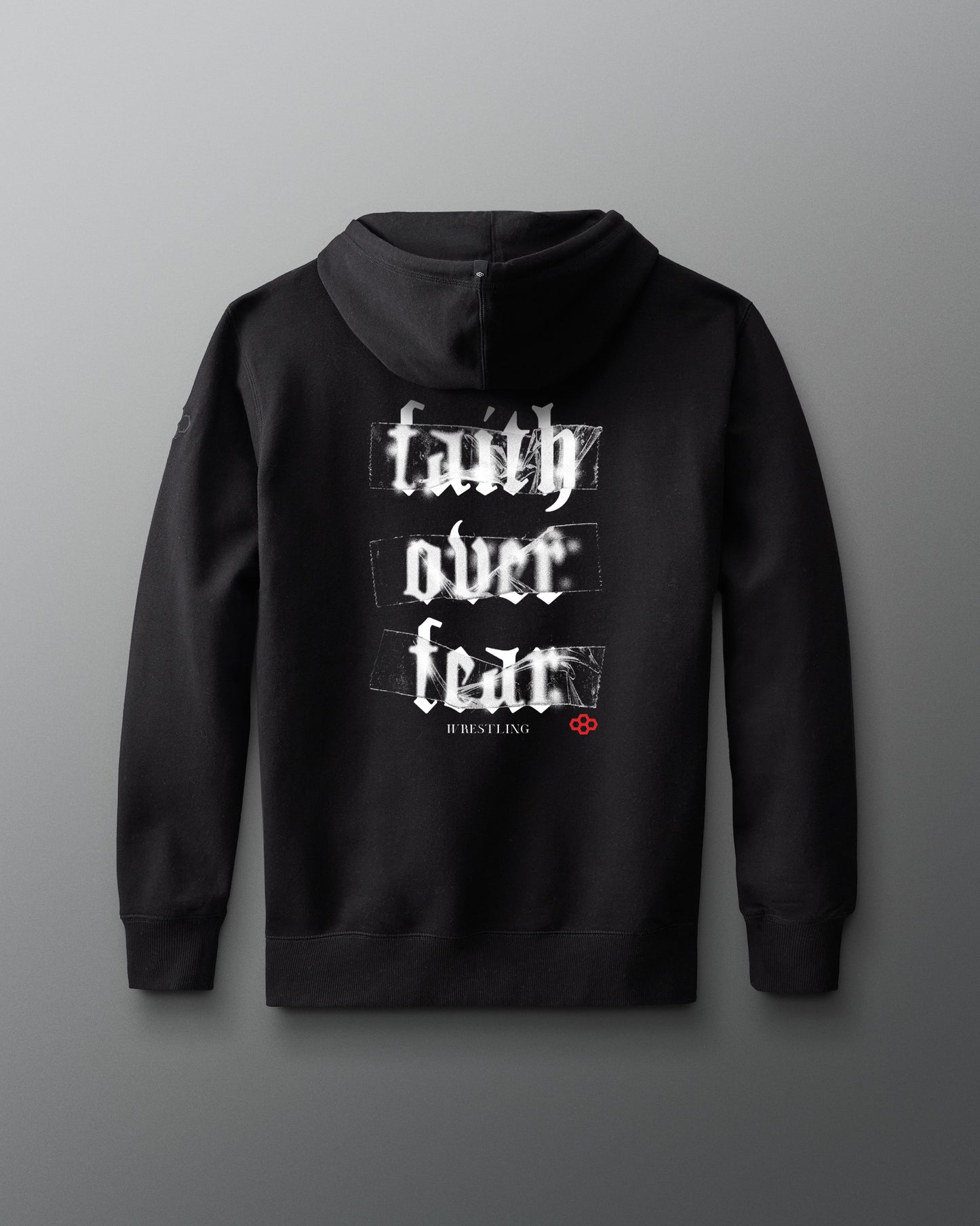 Black hoodie with 'faith over fear' text on the back against a gray background. wrestlers hoodie.