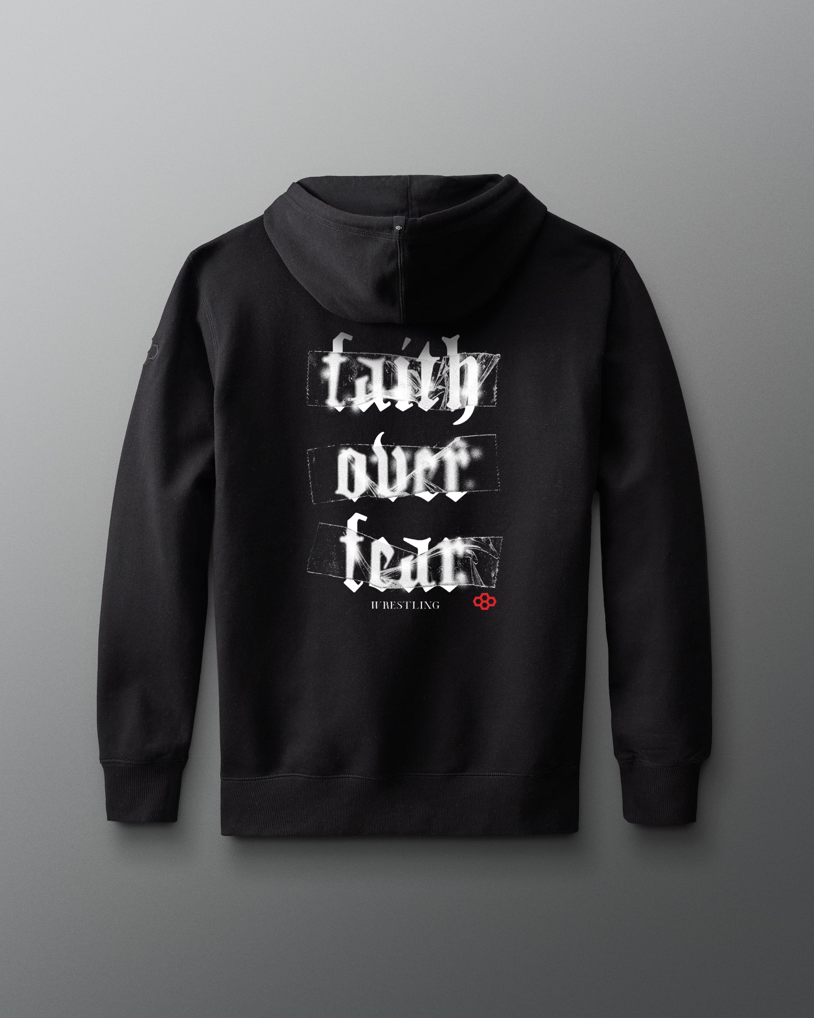 Black hoodie with 'faith over fear' text on the back against a gray background. wrestlers hoodie.