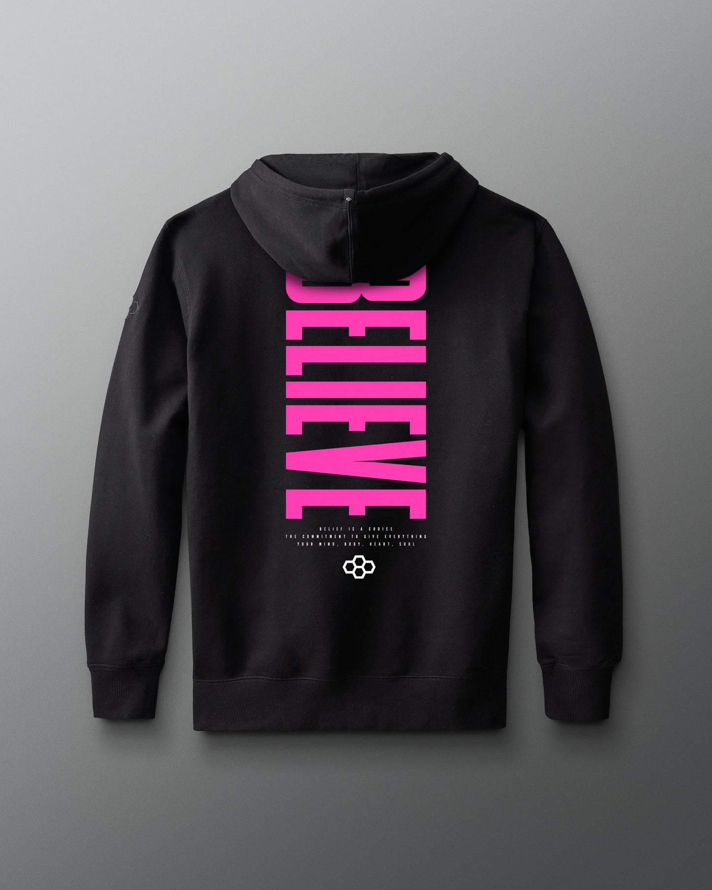 Black hoodie with pink 'BELIEVE' text on a gray background