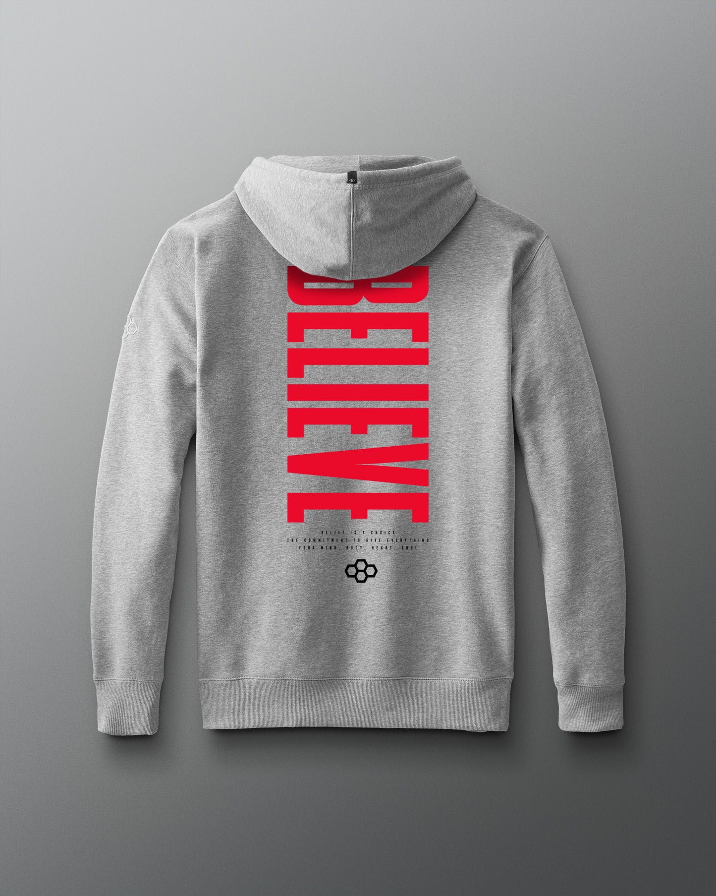 Gray hoodie with 'BELIEVE' printed in red on the back against a gray background