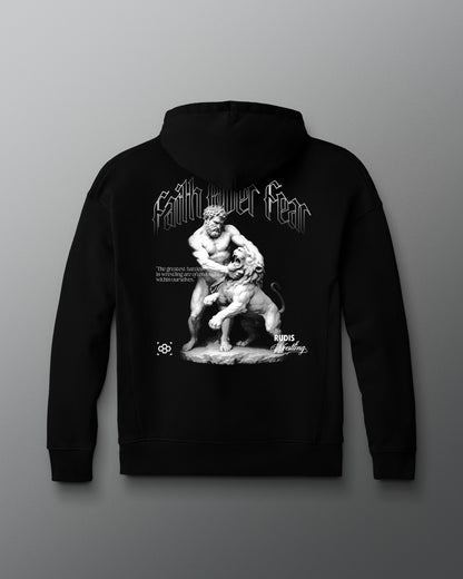 Black hoodie with a graphic design on the back against a gray background