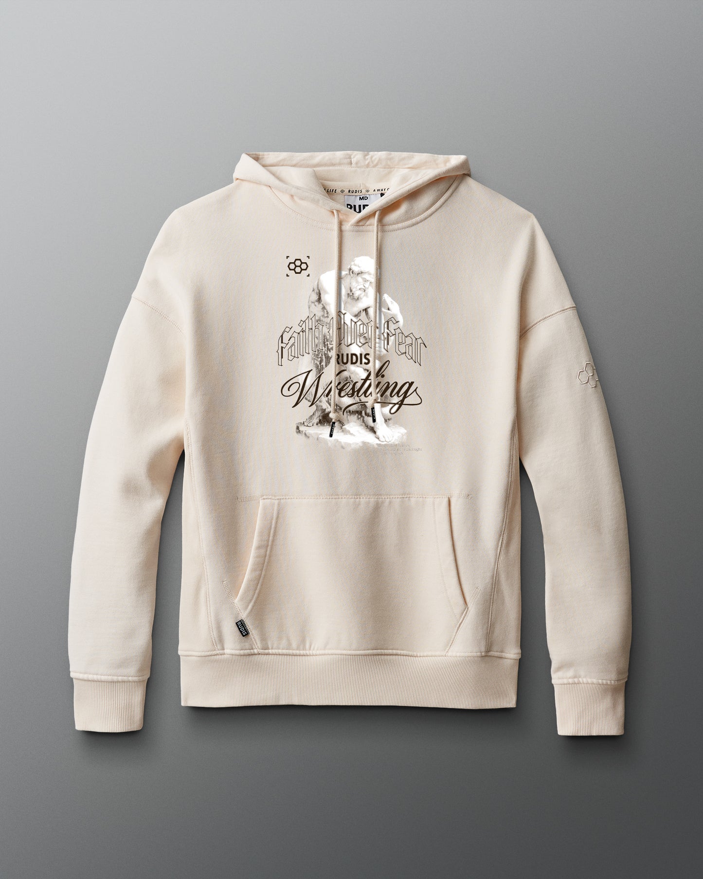Beige hoodie with graphic design on a gray background