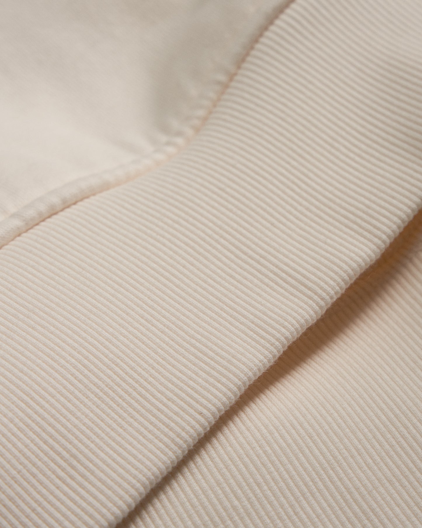 Close-up of a beige fabric texture