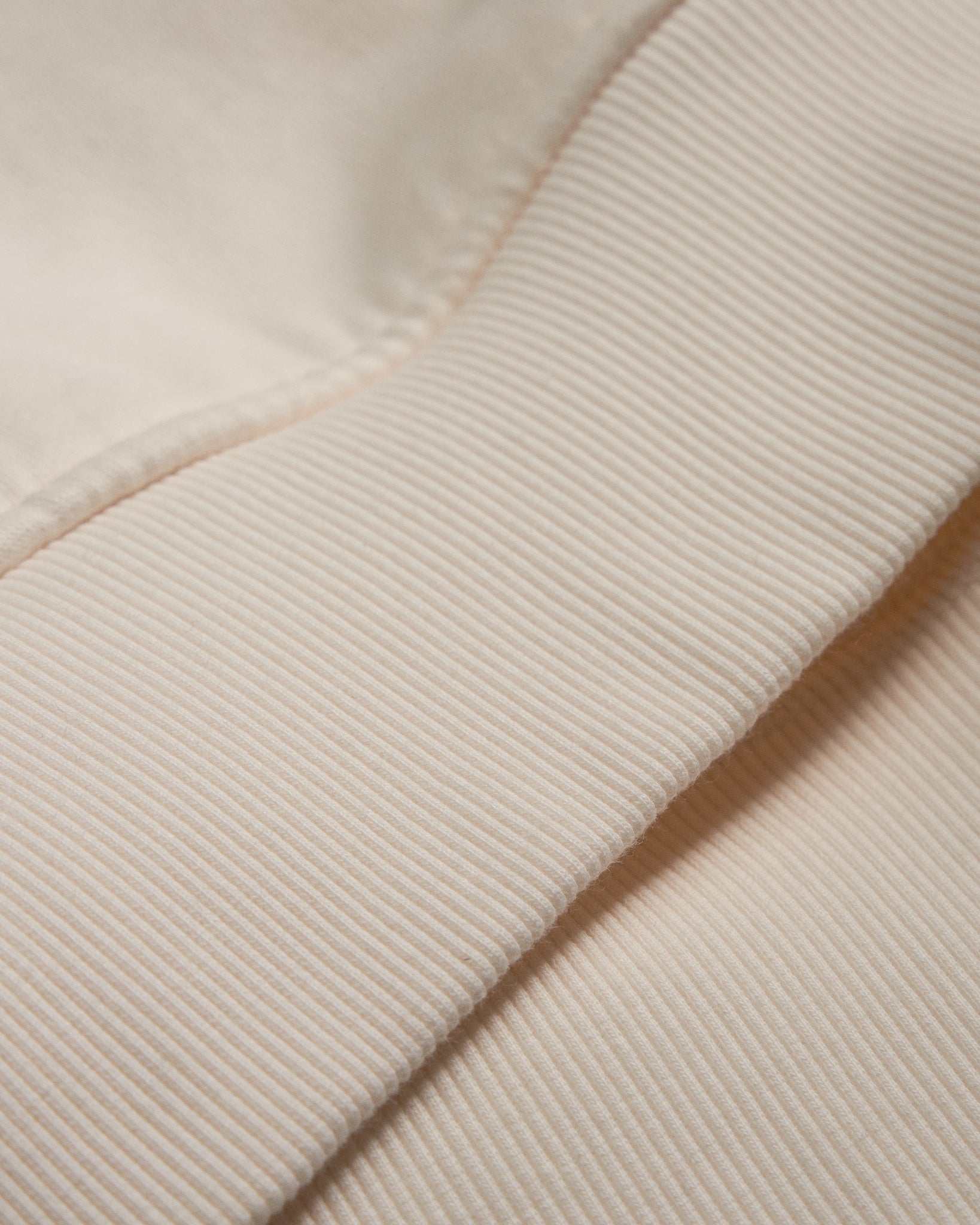 Close-up of a beige fabric texture